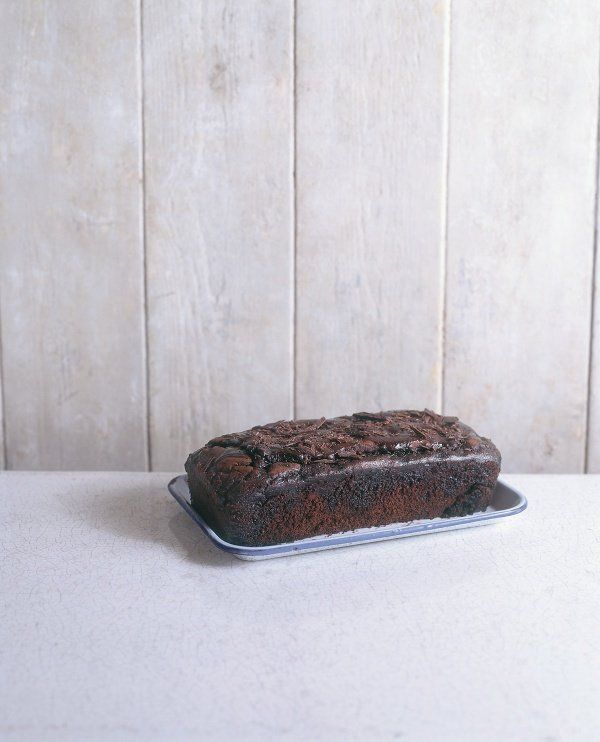 a loaf of chocolate cake sitting on top of a pan