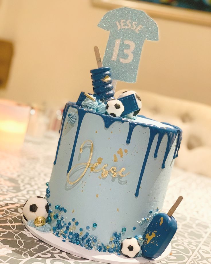 a soccer themed birthday cake on a table