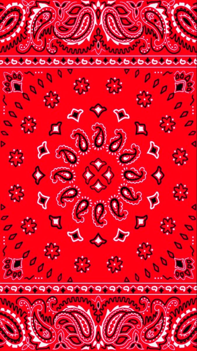 a red bandanna with black and white designs