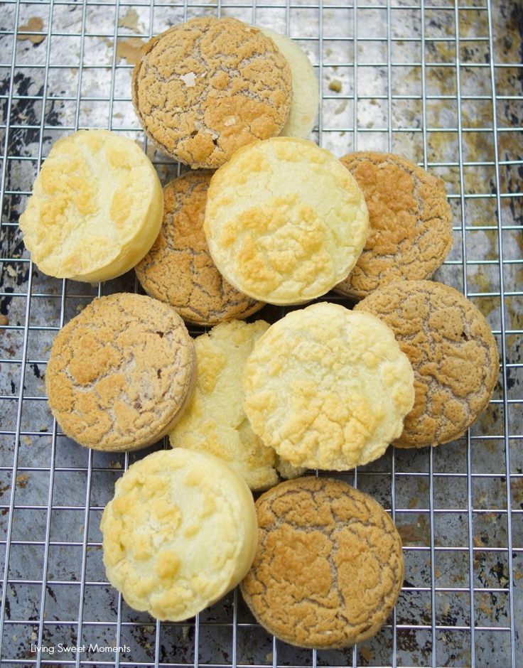 a bunch of cookies sitting on top of a cooling rack