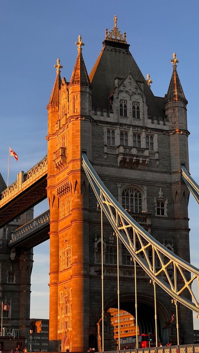 the tower bridge is very tall and has many spires