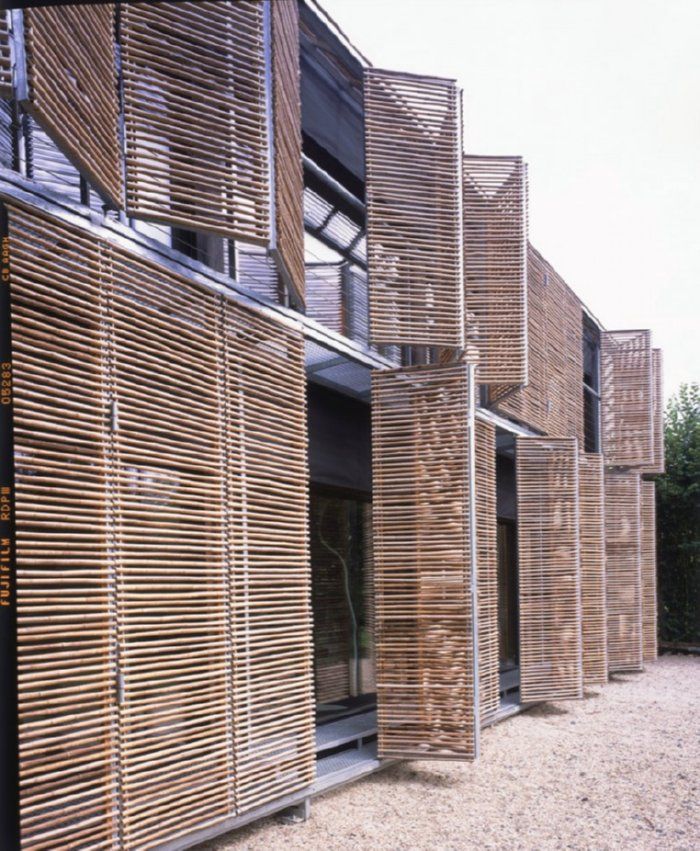 a building made out of wooden slats