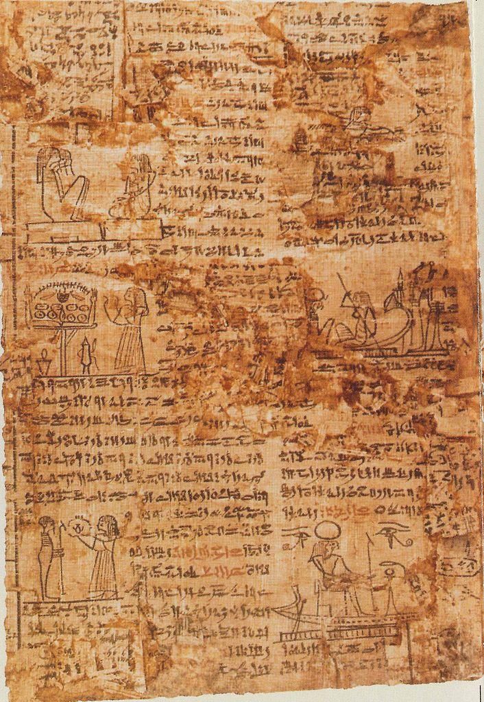 an old piece of paper with writing and pictures on the pages, including egyptian symbols