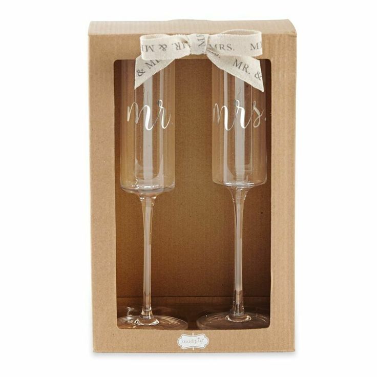 two wine glasses in a cardboard box with a bow on the top one is for mr and mrs