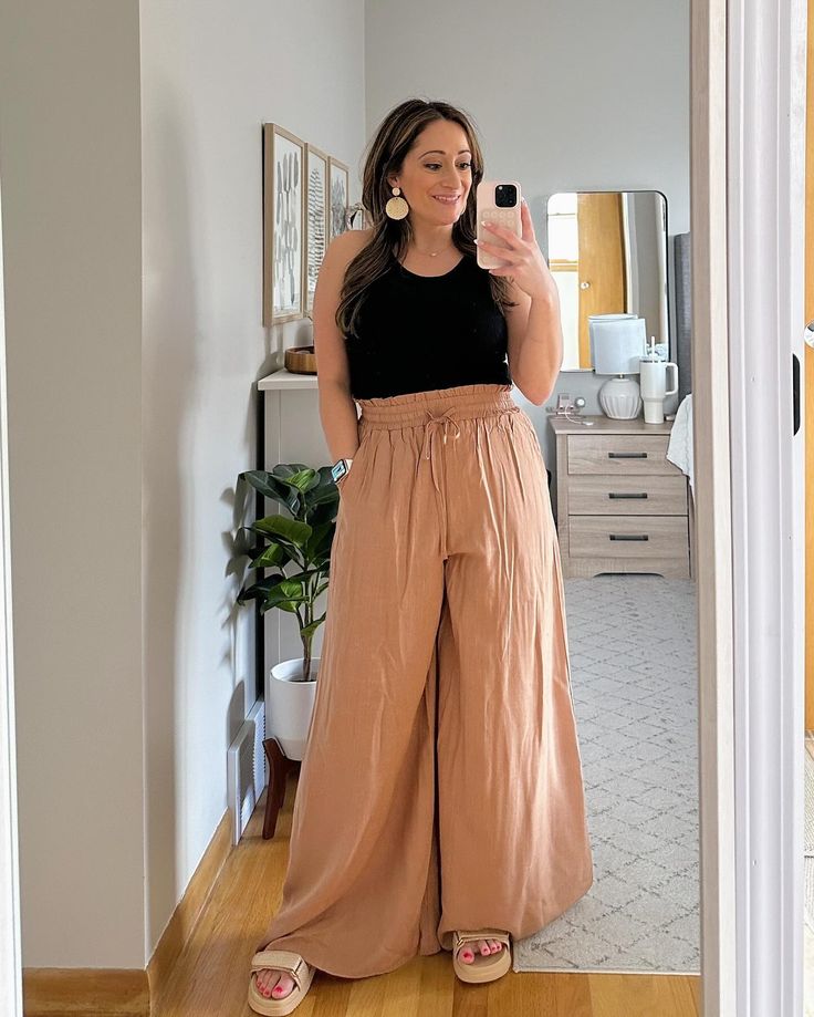 🤎These Amazon pants!🤎 I styled these beautiful Amazon linen pants a few ways, and they are just gorgeous in person! The movement they have and the statement they make are just so fun!! I’m 5’1” and they do hit the floor a bit, but I do not mind! I may wear wedge heels with this instead next time!! ✨Shop thru my LTK link in bio OR 🔗Comment LINK for a DM from me with shopable link #salesandsplurges #petite #petitestyle #petitefashion #springdresses #amazonfashion #amazon #ifounditonamazon ... Vacation Wide-leg Pants With Loosely Fitted Hips, Breezy Wide-leg Vacation Pants, Linen Wide-leg Pants For Vacation, Vacation High-waisted Linen Pants, Vacation Linen Wide-leg Bottoms, Tropical Outfits, Mommy Outfits, Look Plus Size, Sweet Style