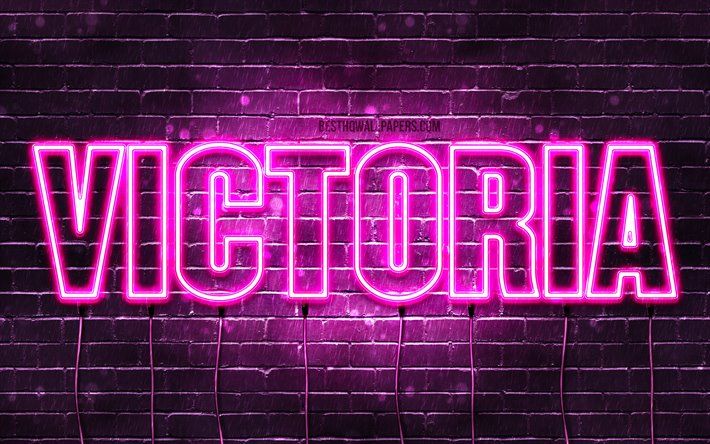 the word victoria written in neon pink on a dark brick wall with lightening effects