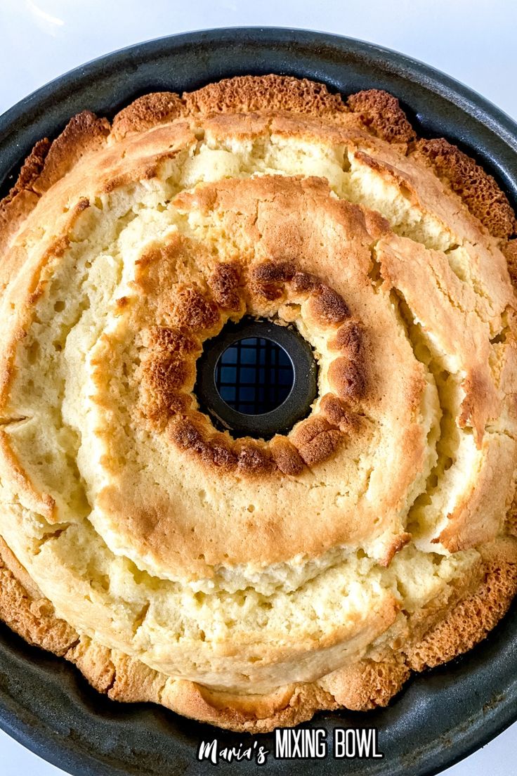 a round cake sitting on top of a pan