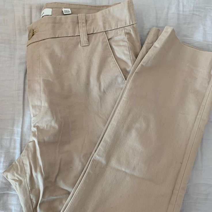 Never Worn/Only Tried On. I'm 4'11 So The Cropped Pants Fit Perfectly. Color: Latte Size: 6 Slim Leg Classic Mid-rise Cream Bottoms, Beige Relaxed Fit Straight Leg Dress Pants, Cream Straight Leg Pants For Business Casual, Cream Straight Leg Bottoms For Business Casual, Business Casual Cream Straight Leg Bottoms, Chic Beige Tapered Leg Chinos, Casual Straight Leg Dress Pants In Neutral Color, Casual Neutral Straight Leg Dress Pants, Mid-rise Neutral Workwear Pants