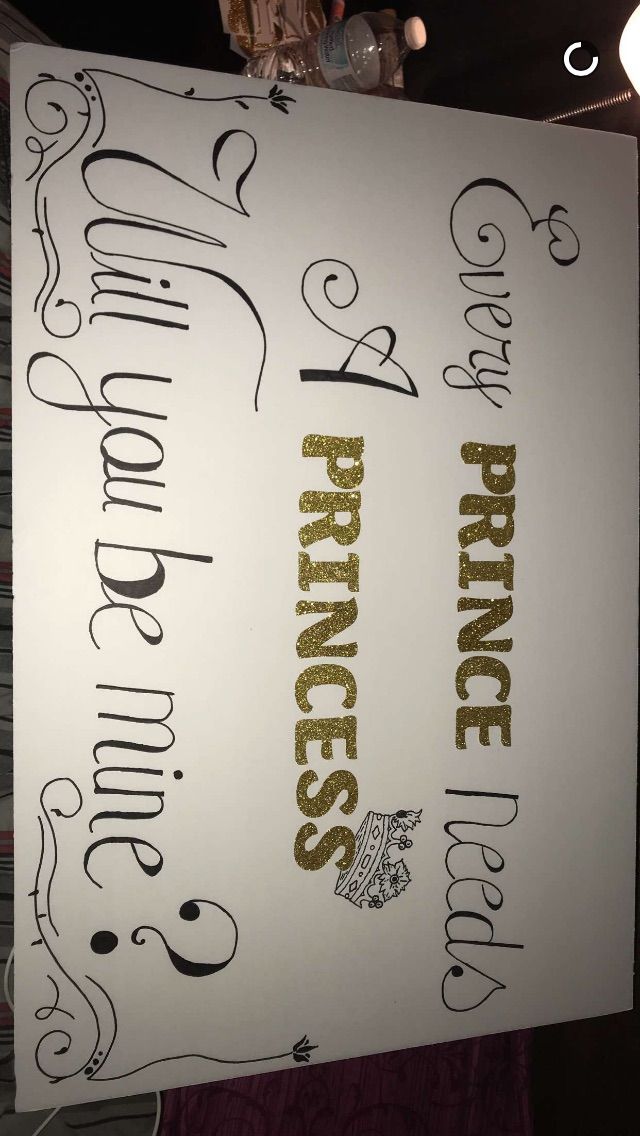 a white sign with gold writing on it that says prince and princess in cursive writing