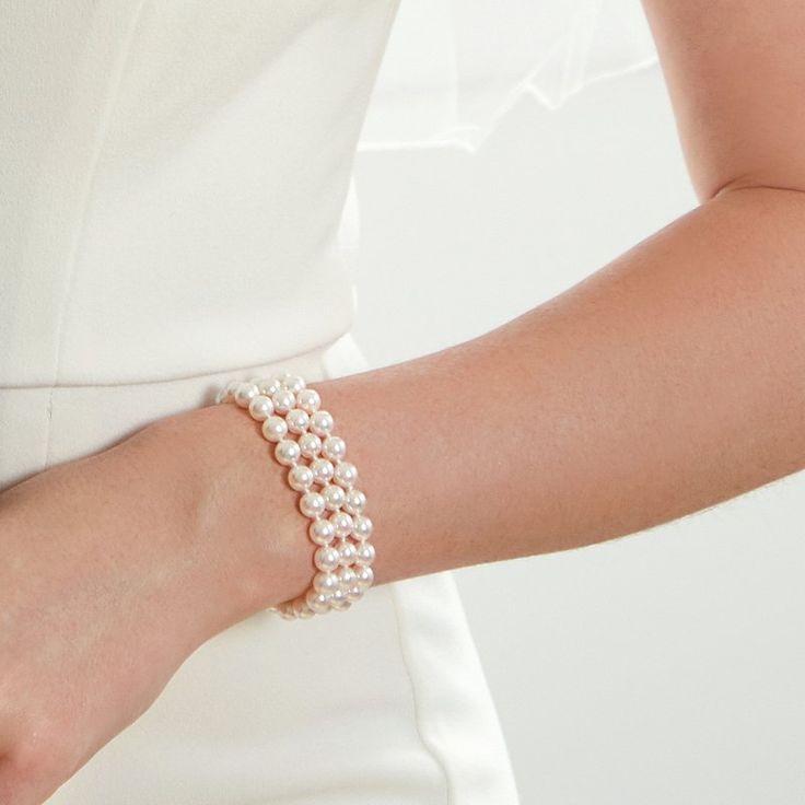 Triple Akoya Pearl Bracelet - Model Image Formal Pearl White Bracelet With Pearl Chain, Formal Pearl White Pearl Bracelet With Pearl Chain, Formal Pearl White Pearl Chain Bracelet, Formal Pearl White Beaded Bracelets With Pearl Chain, White Akoya Pearl Chain Bracelet, Formal White Pearl Embellished Bracelets, Formal White Pearl Bracelets, Formal Pearl Bracelet With Round Beads, Elegant White Pearl Chain Bracelets