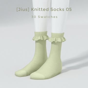 two pairs of socks with ruffles on the ankles and feet, both in light green