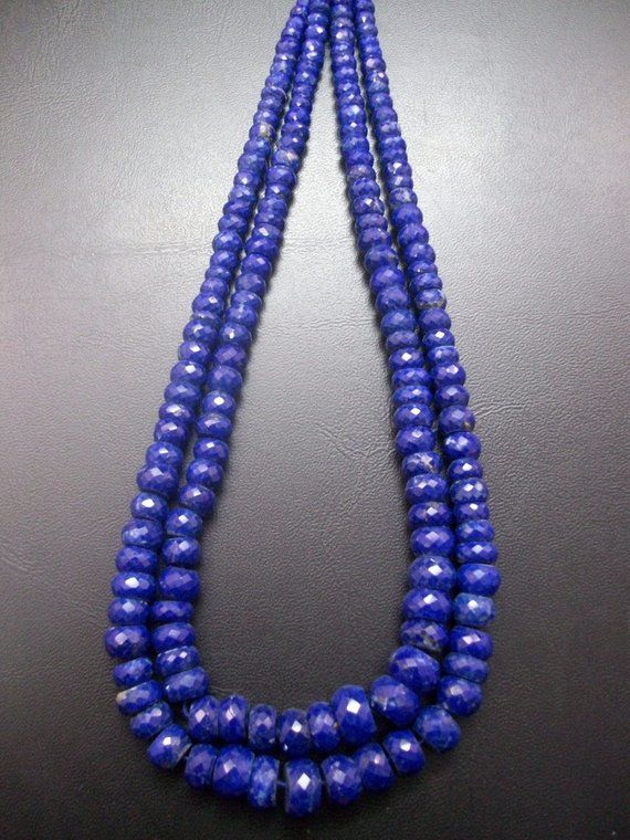 GEMSTONE NAME :- NATURAL LAPIS LAZULI FACETED GEMSTONESHAPE :- ROUNDELSIZE :- 5 MM - 7 MMLENGTH:-  8 INCH, 16 INCHQUALITY :- AAAFACETED BEADSCOLOR ;- DARK BLUEWE DEAL IN GOOD QUALITY.This listing is one strand for NATURAL LAPIS LAZULI faceted beads, beautiful Beads,The beads have beautiful color about 8 INCH, 16 INCH in length.More beautiful than picture!Please see the photographs to see more detail. The overall quality is excellent for the price!You will receive one full strand.These AAA Grade Gem Stones, Faceted Gemstones, Etsy Jewelry, Faceted Bead, Ethiopian Opal, Lapis Lazuli, Etsy Finds, Cobalt, Small Businesses