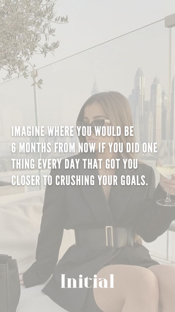 a woman sitting on top of a bed holding a glass of wine with the caption, i imagine where you would be 6 months from now if you did one thing every day that got you close to crush your goals