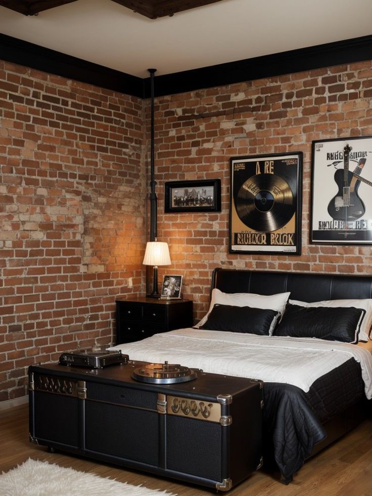 a bedroom with brick walls and white bedding, black furniture and pictures on the wall