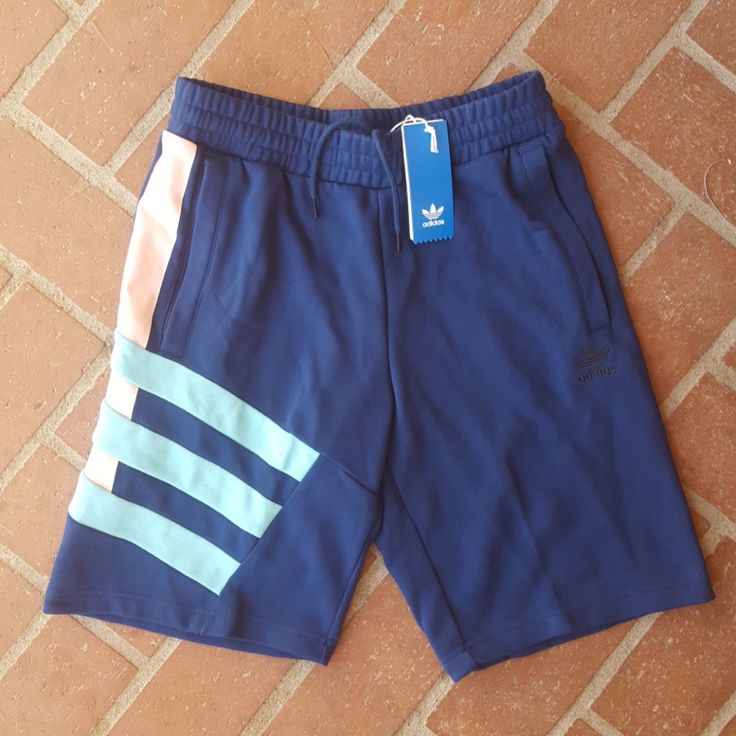 New With Tags Cotton Shorts With Zipper Pockets Adidas Cotton Bottoms With Built-in Shorts, Adidas Three Stripes Shorts For Spring, Adidas Three Stripes Shorts For Summer, Adidas Three Stripes Summer Shorts, Cotton Shorts With Three Stripes, Spring Athleisure Bermuda Bottoms, Spring Cotton Shorts With Three Stripes, Adidas Cotton Shorts For Summer, Adidas Cotton Shorts For Spring