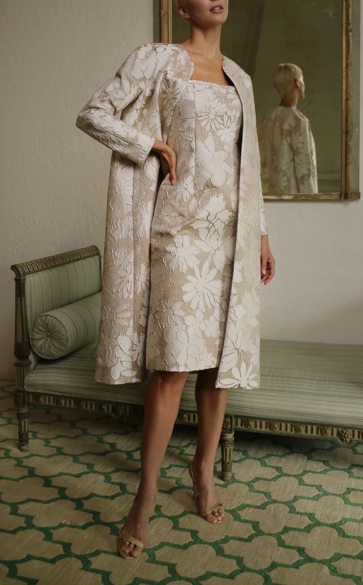 Known for using exquisite textiles from the finest European mills, Barbara Tfank’s collections are classic and timeless in French brocades, Italian silks, intricate jacquards, and more. Boasting a textured, decorous appeal, the Over Coat in Daisy Brocade is cut in a classic, yet feminine shape, giving grace along with all the right tailoring touches. Product Details Silk. Please contact customercare@overthemoon.com if you are interested in a made-to-measure order. Care Instructions Dry-clean only. Size & Fit This item fits true to size. Shipping Details This item is made-to-order. Please allow 6-8 weeks for production and 5-7 business days for standard delivery. Return Policy This item is available for return within 15 days of receipt. Three Piece Suit Women's, Barbara Tfank, Giving Grace, Drop Waist Gown, Evening Coat, Satin Coat, Over Coat, Bridal Handbags, Column Gown