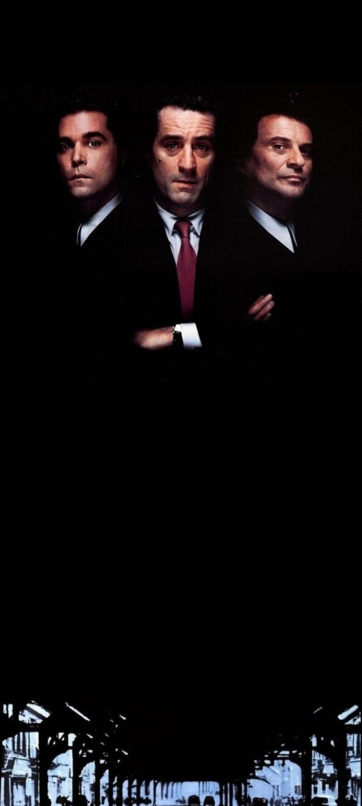 three men in suits and ties are standing next to each other