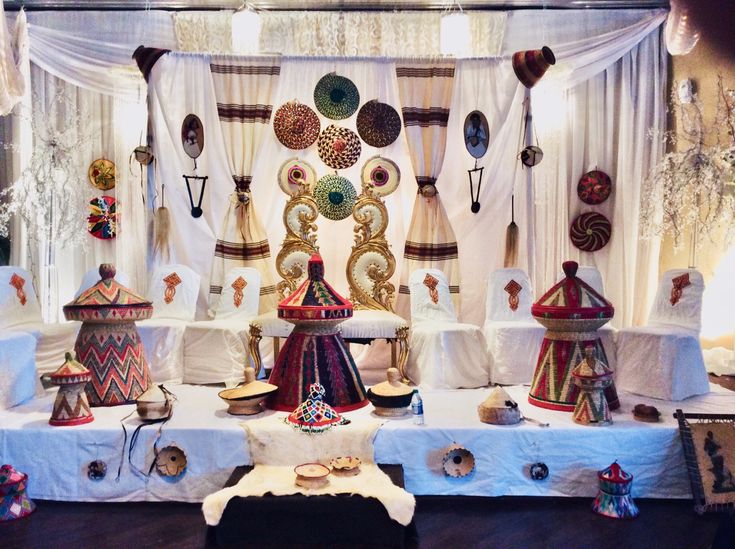 a table topped with lots of decorative items