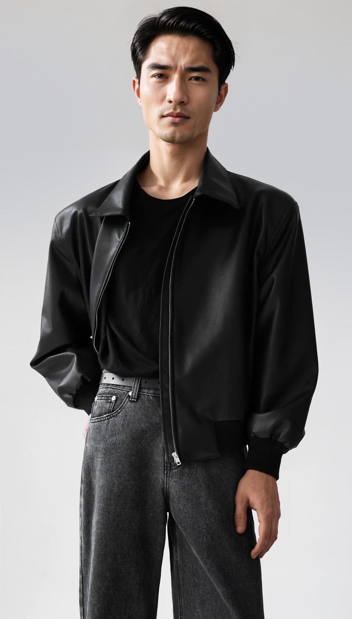 Embrace an effortless edge with our Faux Leather Zip-Through Collared Cuffed Jacket, a piece that speaks to the spirit of urban sophistication.
Crafted from premium faux leather with a matte finish, this jacket features a zip-through front and a classic collar, complementing a sharp, contemporary silhouette. Ribbed cuffs and a sleek lining elevate functionality, ensuring comfort and durability. Impeccable stitching and a smooth texture make it a staple for any modern wardrobe.
Perfect for transi Urban Sophistication, Casual Tees, Modern Wardrobe, Urban Wear, Black Xs, City Streets, Casual Tee, Smooth Texture, Uganda