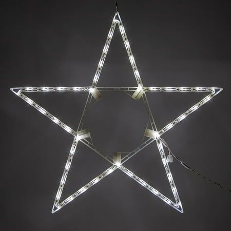 a large lighted star hanging from the ceiling