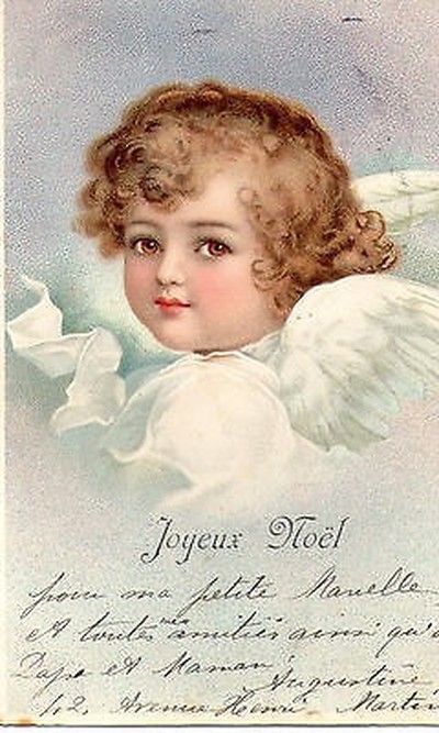 an old fashioned christmas card with an angel