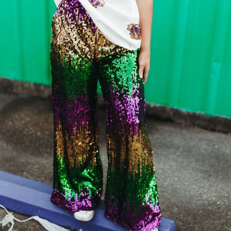 Mardi Gras Sequin Wide Leg Pants Multicolor Sequined Bottoms For Party Season, Purple Party Bottoms For Spring, Purple Bottoms For Spring Party, High Waist Purple Bottoms For Night Out, Fitted Purple Bottoms For Party Season, Multicolor Bottoms For Party Season Night Out, Multicolor Bottoms For Night Out Party Season, Multicolor Sequined Party Pants, Multicolor Sequin Party Pants