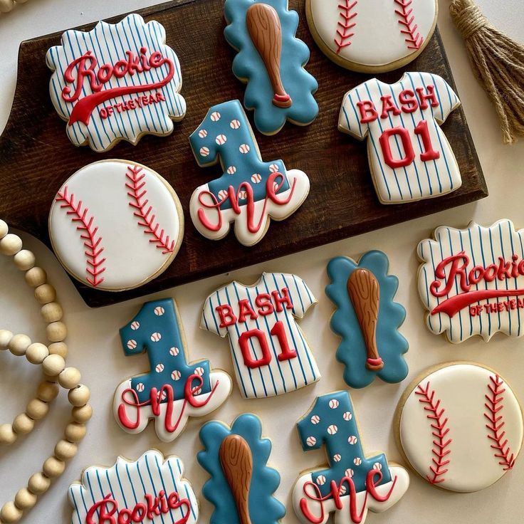 decorated cookies are displayed on a table