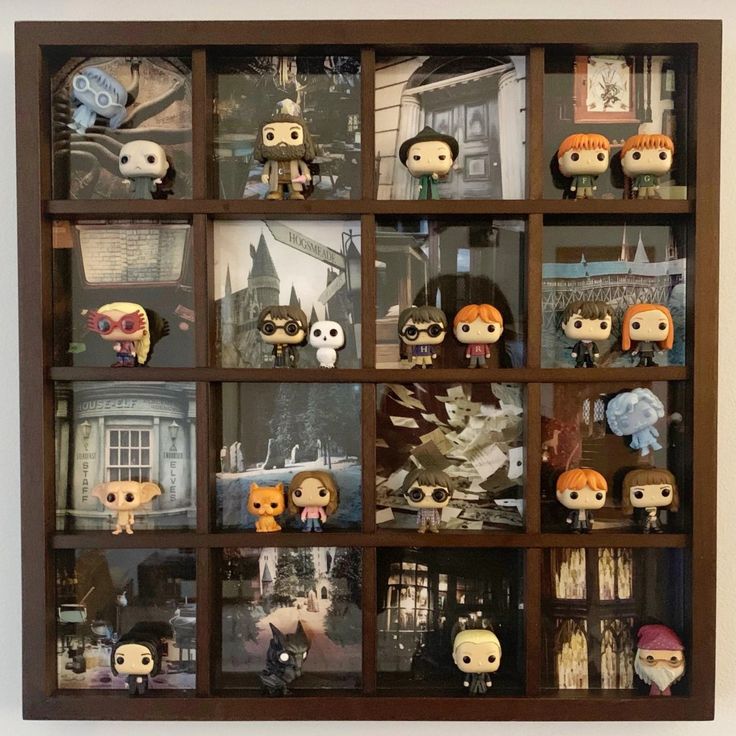 a display case filled with lots of different types of pop culture figurines and action figures