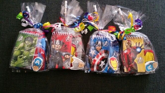 five plastic bags filled with cartoon character toys