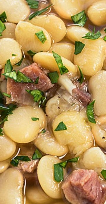 a close up view of some food with meat and vegetables in it on a plate