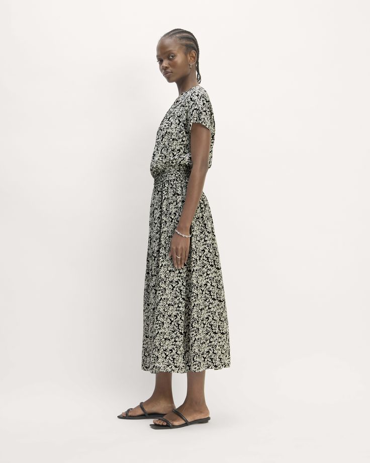 About This Style. This piece features a relaxed fit, maxi length, made from FSC-certified viscose, crewneck with shirring, cap sleeves, button closure at center back neck, with elastic smocking detail to create shirring waist, and lined bodice. Women Gathering, Bone White, Midi Length Dress, Black Midi Dress, Dress Making, Midi Length, Cap Sleeves, Smocking, Bodice