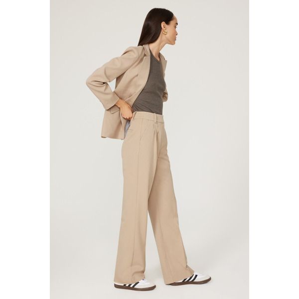 Beige crepe (63% Polyester, 32% Rayon, 5% Elastane). Lining (100% Cotton). Pants. Front hook and eye closure. 34" inseam, 12.75" rise. Imported.¬† Tailored Beige Wide Leg Pants, Spring Wide Leg Tailored Work Pants, Tailored Wide Leg Pants For Spring Workwear, Casual Office Pants With Pressed Crease, Classic Wide-leg Spring Pantsuit, Spring Classic Wide-leg Pantsuit, Classic Spring Wide-leg Pantsuit, Beige Straight Leg Pants For Office, Spring Workwear Straight Leg Pantsuit