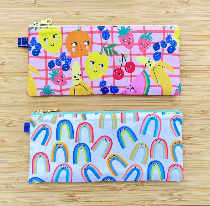 "This slim, minimalist pencil pouch is perfectly sized to hold all your favorite school and office supplies - pencils, pens, markers, scissors, you name it. It works just as well as a cosmetics bag or clutch!  Constructed using 100% cotton fabric, with interfacing for structure and durability. High quality, sturdy YKK gold metal zipper closure. Approximate dimensions: 8.5\" L x 3.75\" H (8\" opening) Materials:  - 100% cotton exterior fabric - 100% cotton lining fabric - Interfacing (for structu Rectangular Zipper Pouch Pencil Case For Back To School, Trendy Rectangular Pencil Case With Pen Slots, Trendy Stationery With Pen Slots For Personal Use, Back To School Rectangular Zipper Pouch Stationery, Trendy Everyday Pencil Case With Pen Slots, Back To School Rectangular Pencil Case With Pen Holders, Playful Pencil-shaped Pencil Case With Pen Holders, Trendy Rectangular Stationery For Everyday Use, Pencil-shaped Zipper Pouch Pencil Case For Organization