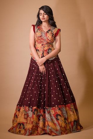 Maroon attached cancan lehenga with hand painted kalamkari border and embroidered glass beads. Paired with a padded peplum blouse with cream ajantha work, glass beads embroidery and pleat detailing on sleeves. - Aza Fashions Peplum Blouse Pattern, Kurta Lehenga, Kalamkari Designs, Kalamkari Blouse, Gown Party Wear, Long Gown Design, Casual Frocks, Lehenga Designs Simple, Half Saree Designs