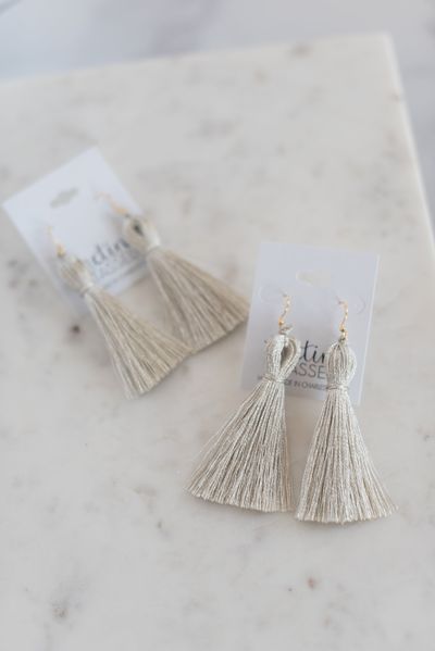 Featured here in metallic silver, our signature tassel earrings are a lightweight statement drop accented by gold hardware for added sparkle. Tassel earring measures 3" long with 14k gold-plated, nickel-free hardware. Handmade in Charleston, South Carolina. Diy Tassel Earrings, Macrame Tassel, Silver Tassel Earrings, Earrings Tutorial, Tassel Earring, St Margaret, Diy Tassel, Earrings Diy, Classic Earrings