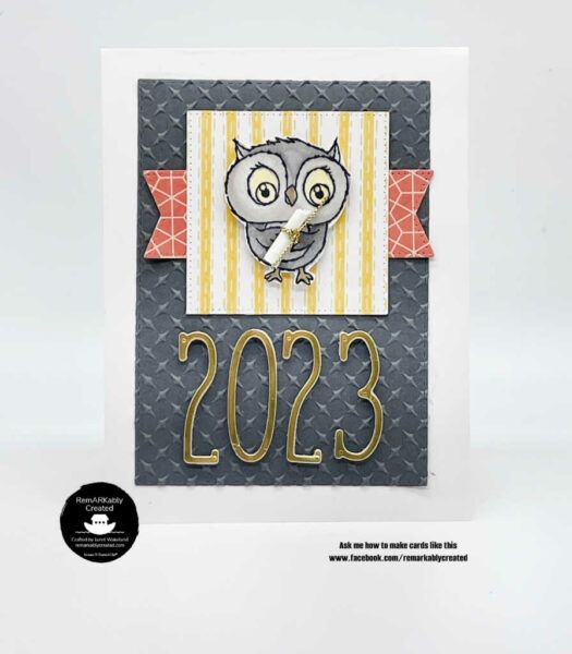 a card with an owl on it and the number 2053 written in gold letters