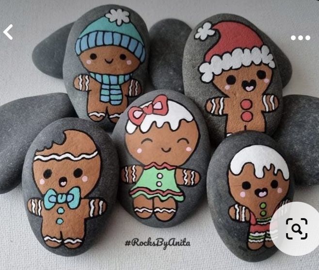 four gingerbread men painted on some rocks