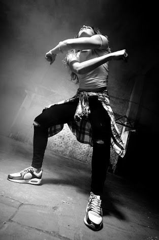 black and white photograph of a woman dancing