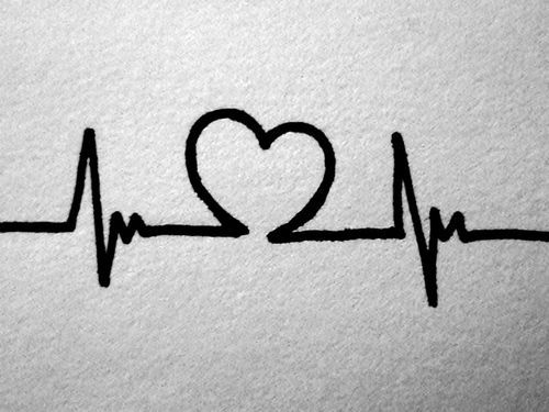 a drawing of a heart and heartbeat with the word i love you written on it