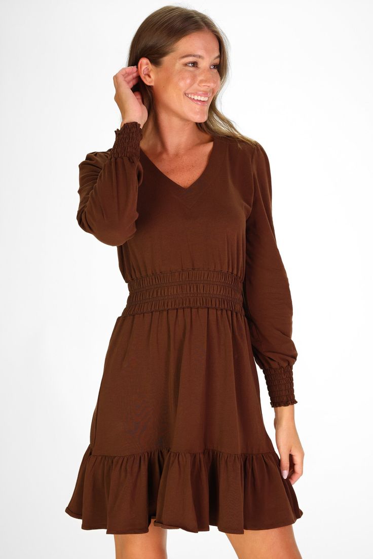 Start the season in style with the Vale Dress! With flattering ruffles, long sleeves, and a cinched waist you can't ask for a more classic Fall dress! FAVORITE FEATURES: Peruvian Stretch Cotton Cinched & Smocked Waist & Cuffs V-Neck Tiered Ruffle Front Long Sleeve Midi Dress With Ruffle Hem, Casual Long Sleeve Ruched Dress, Casual Long-sleeved Midi Dress With Gathered Waist, Casual Long Sleeve Dress With Gathered Waist, Flowy Long Sleeve Dresses With Gathered Waist, Casual Long Sleeve Midi Dress With Gathered Waist, Long Sleeve Flowy Dresses With Gathered Waist, Fall Dresses With Elastic Sleeves, Long Sleeve Midi Dress With Gathered Waist