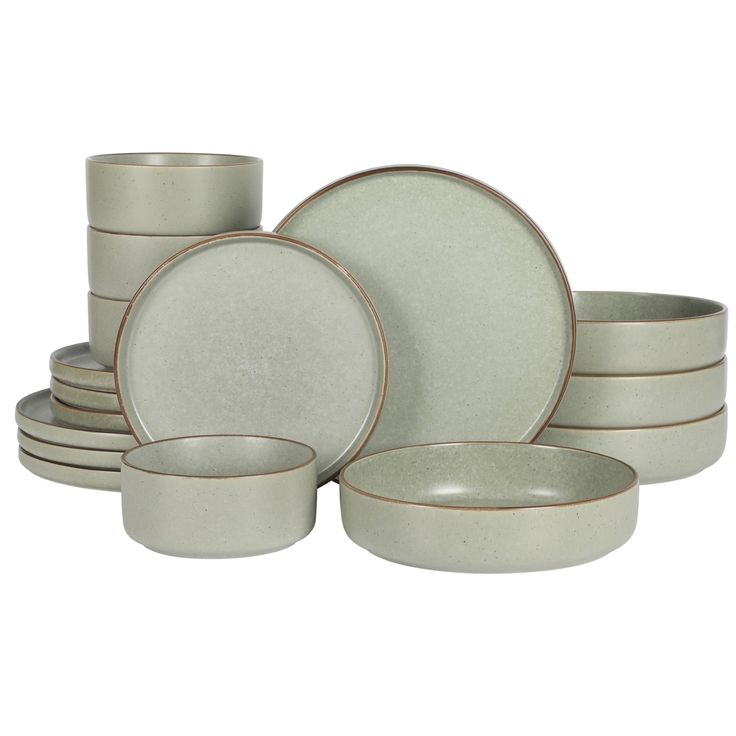 an assortment of grey dishes and bowls