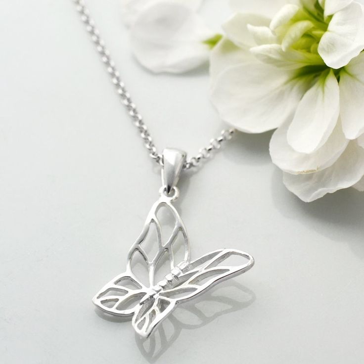 When you have this sterling silver butterfly necklace adorning your neck you'll brighten any winters day or sparkle on a summers one.  Our everyday essential silver butterfly necklace is the perfect treat for you or that someone special. Whether you're adding a boho vibe to a summer dress or impact to a little black one this adorable pendant with its dynamically different angled position is a fabulous finishing touch. Symbolising new life and new beginnings this butterfly necklace is an apt gift for someone starting a new adventure in life or a little treat to put that spring in your step. All Martha Jackson jewellery comes complete with a gift box and blank gift card for you to write a short message on made from: Sterling silver - please use an anti tarnish cloth occasionally. dimensions: Butterfly Jewellery, Silver Butterfly Necklace, Butterfly Pendant Necklace, Butterfly Jewelry, Silver Butterfly, Dangly Earrings, Gift Message, Affordable Jewelry, Butterfly Necklace