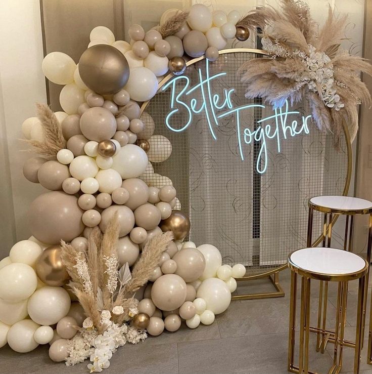 balloons are arranged in the shape of a christmas tree and spell out better together written on it