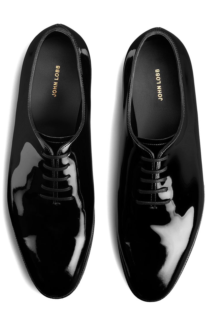 Epitomizing minimalist styling and expert craftsmanship, this glossy oxford is cut from one piece of calfskin leather and sewn together with a single seam. Lace-up style Leather upper, lining and sole Made in the UK Men's Designer Shoes Modern Fitted Oxfords With Pointed Toe, Classic Patent Leather Oxfords With Leather Lining, Sleek Patent Leather Oxfords For Derby, Fitted Patent Leather Oxfords For Office, Modern Black Fitted Oxfords, Modern Fitted Black Oxfords, Sleek Black Oxfords, Goodyear Welted Patent Leather Oxfords For Work, Modern Fitted Oxford Shoes For Office