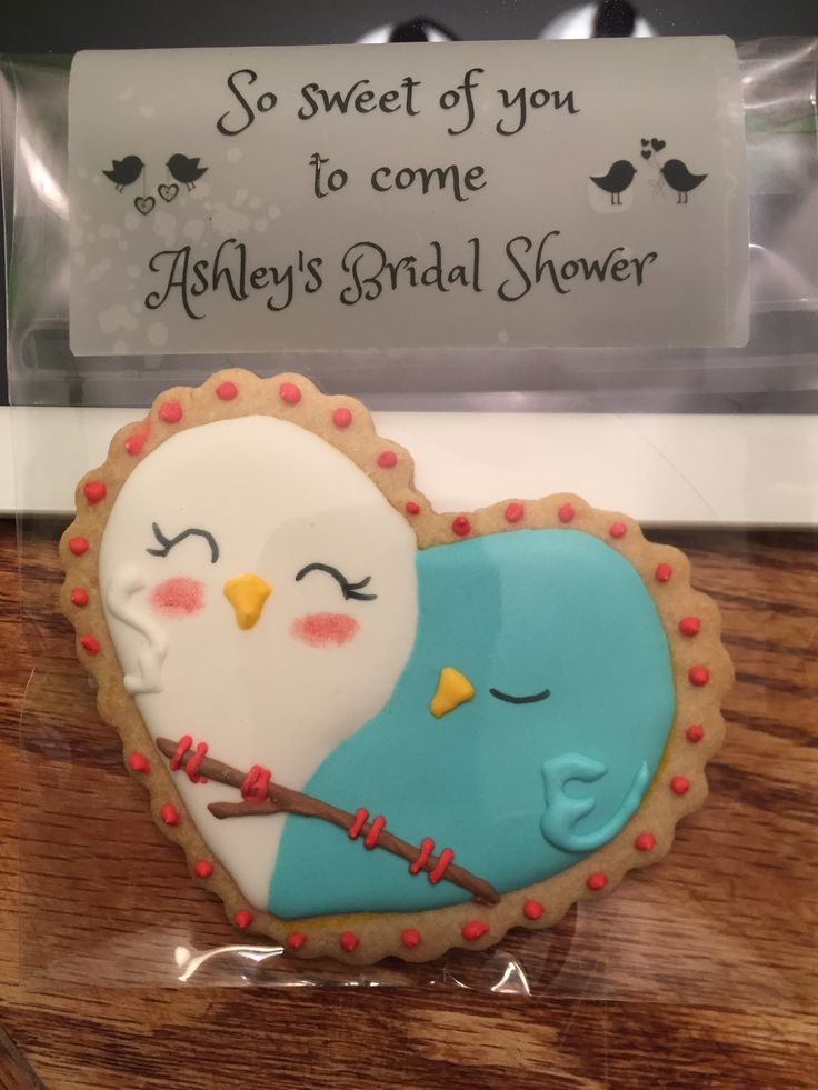 a decorated cookie in the shape of an owl