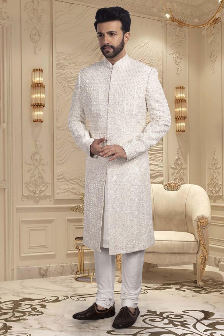 Introducing the ultimate luxury for grooms - our Mens Sherwani R14-S059. Featuring intricate cutdana and stone embroidery, this sherwani exudes elegance and sophistication. Make a statement on your special day with this stunning and exclusive piece. Sophisticated Man, Stone Embroidery, Mens Sherwani, Your Special, Special Day, India, Embroidery, Stone