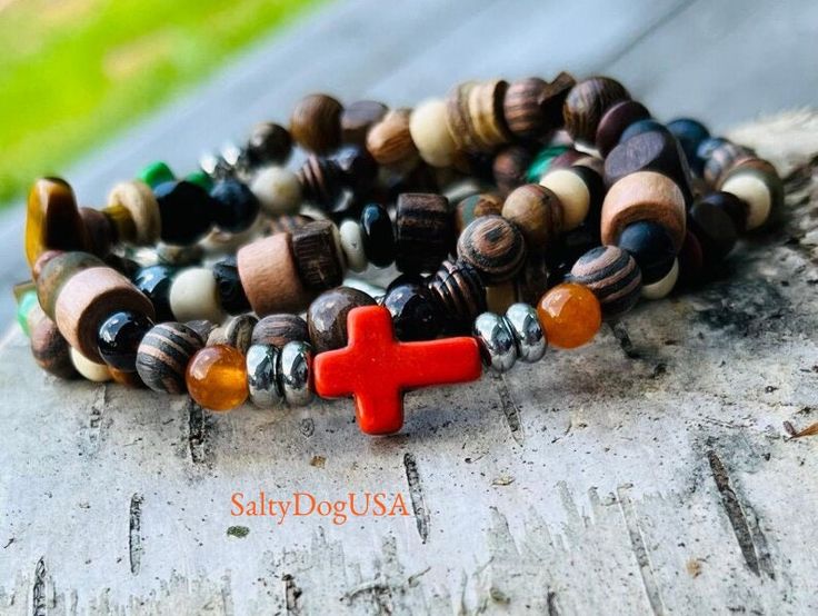 Handmade Unisex Beaded Cross Bracelet Spiritual Gift Idea for everyday wear or any religious event! Catholic Bracelet. Spiritual Bracelet.  I made this Rustic Cross Bracelet with 6mm Gemstones, Coconut Wood, Gunmetal Spacers, Orange Howlite  Sideways Cross. On Jewelers Stretch Cord.  Includes a Complimentary Gift Box with Silver Stretch Bow.    ✨These gemstones have a calming and soothing energy to encourage mindfulness, restore balance and therefore bring stress relief.  *Gift Giving Ideas: BFF Adjustable Cross Jewelry With Wooden Beads, Spiritual Cross Bracelets, Adjustable Wooden Beads Cross Jewelry, Spiritual Brown Rosary Bracelet With Cross, Handmade Spiritual Beaded Bracelets With Cross, Handmade Spiritual Cross Beaded Bracelets, Spiritual Beaded Cross Bracelets, Handmade Spiritual Cross Beaded Bracelet, Bohemian Cross Rosary Bracelet Gift