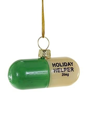 a pill shaped ornament hanging from a cord