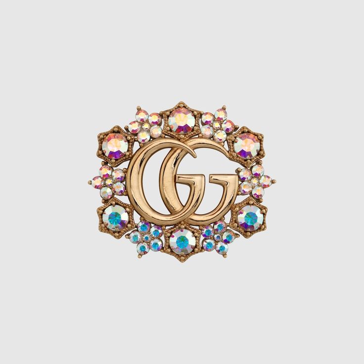 Shop the Double G crystal flower brooch in gold at GUCCI.COM. Enjoy Free Shipping and Complimentary Gift Wrapping. Fall Rings, Guccio Gucci, Group Gifts, Jewelry Pins, Flower Detail, Crystal Brooch, Crystal Flower, Gold Logo, Leather Keychain