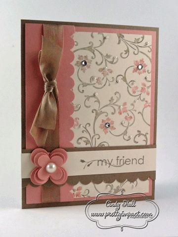 a close up of a card with a bow on the front and back of it